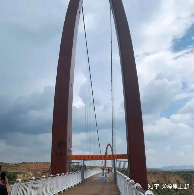 File:BolangguGlassTowerClouds.jpg