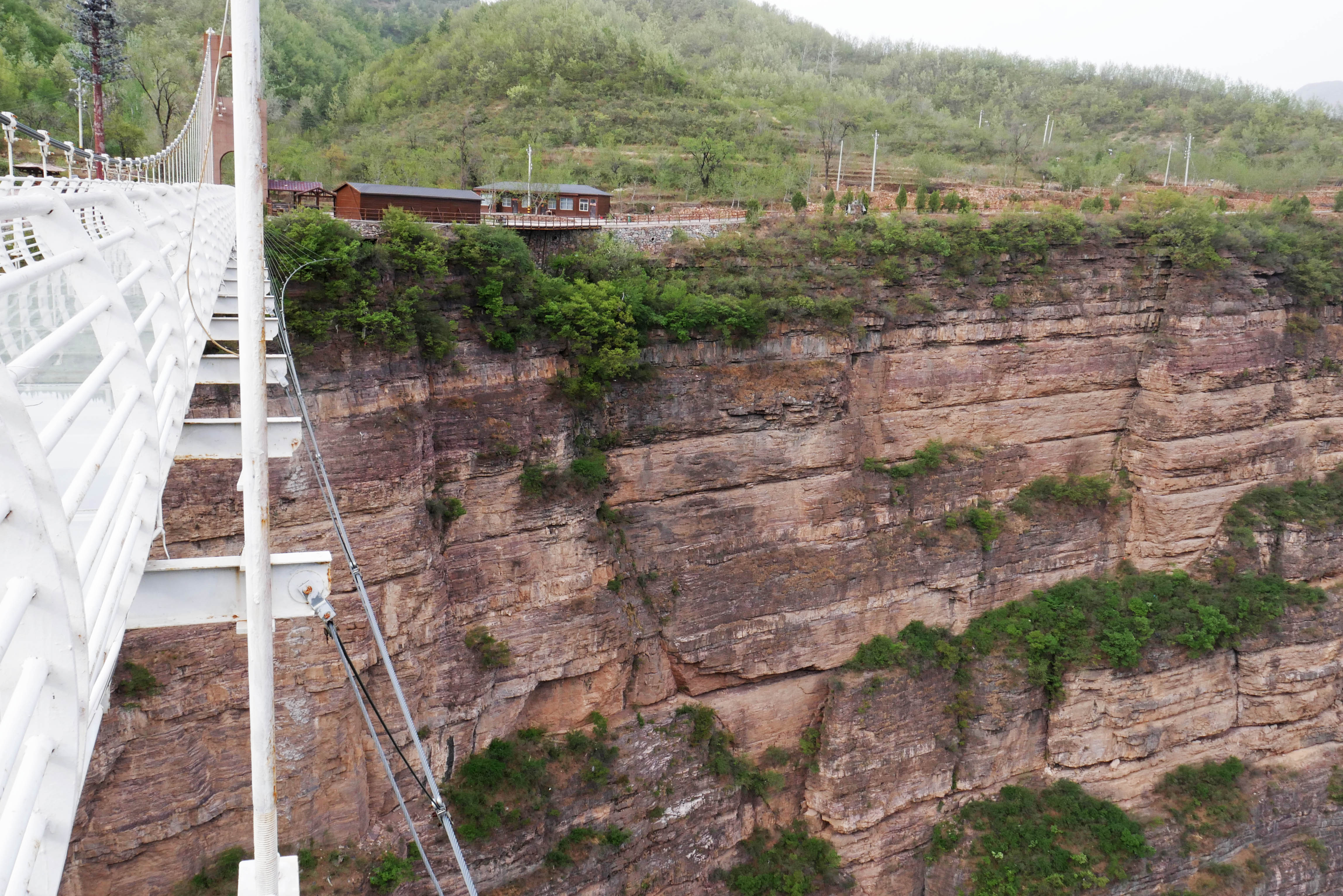 Taihang GlassFootbridgeCliffBrown.JPG
